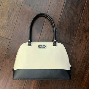 Kate Spade medium size purse.. cream and black never been used
